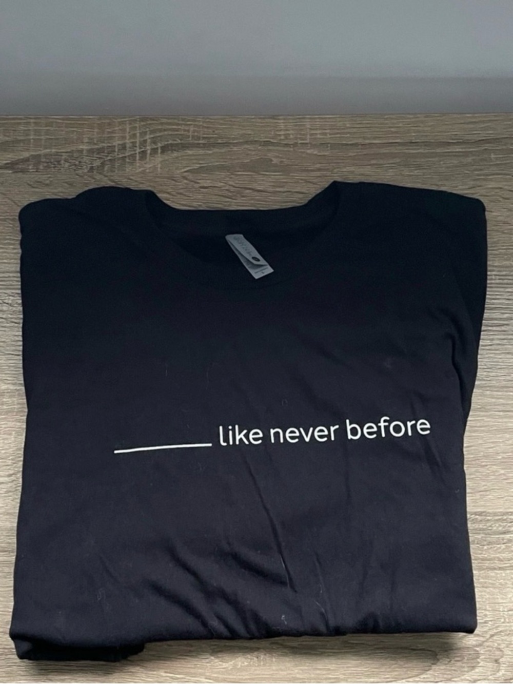 Women's Black Short-Sleeve Tee - Minimal 'like never before' Graphic. Size M.
